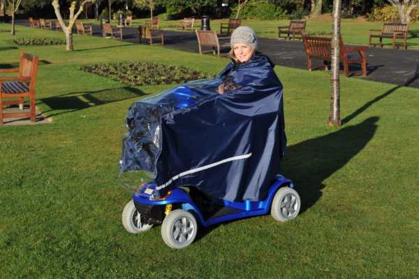 Affordable mobility scooter for outdoor use with weatherproof cover, suitable for elderly and disabled individuals.