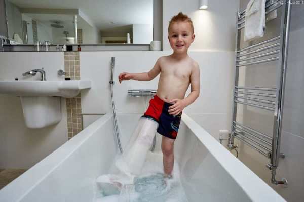 Accessible bathroom bath lift for mobility assistance.