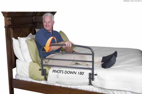 Adjustable bed rail for enhanced mobility and safety in homes and care settings.