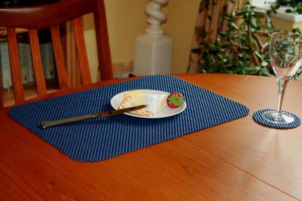 Comfortable blue dining placemat for mobility-friendly dining setups.