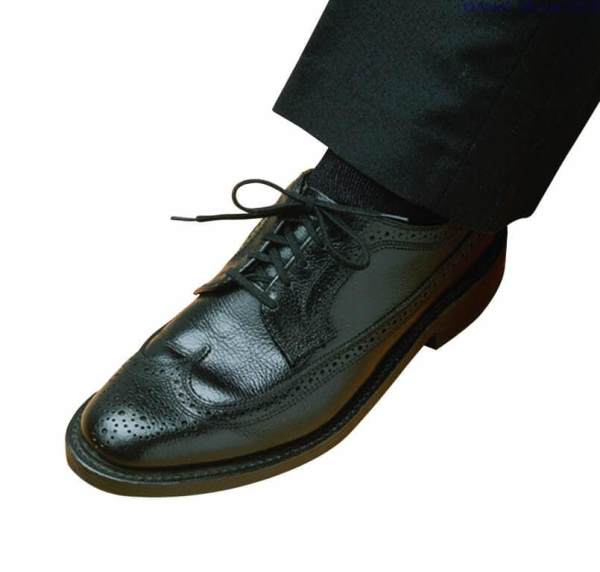 Smart black leather brogue shoe for men, stylish and comfortable footwear.