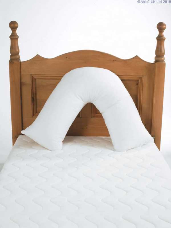 Portable bed wedge pillow for comfortable sleeping and medical support, ideal for mobility and health needs.