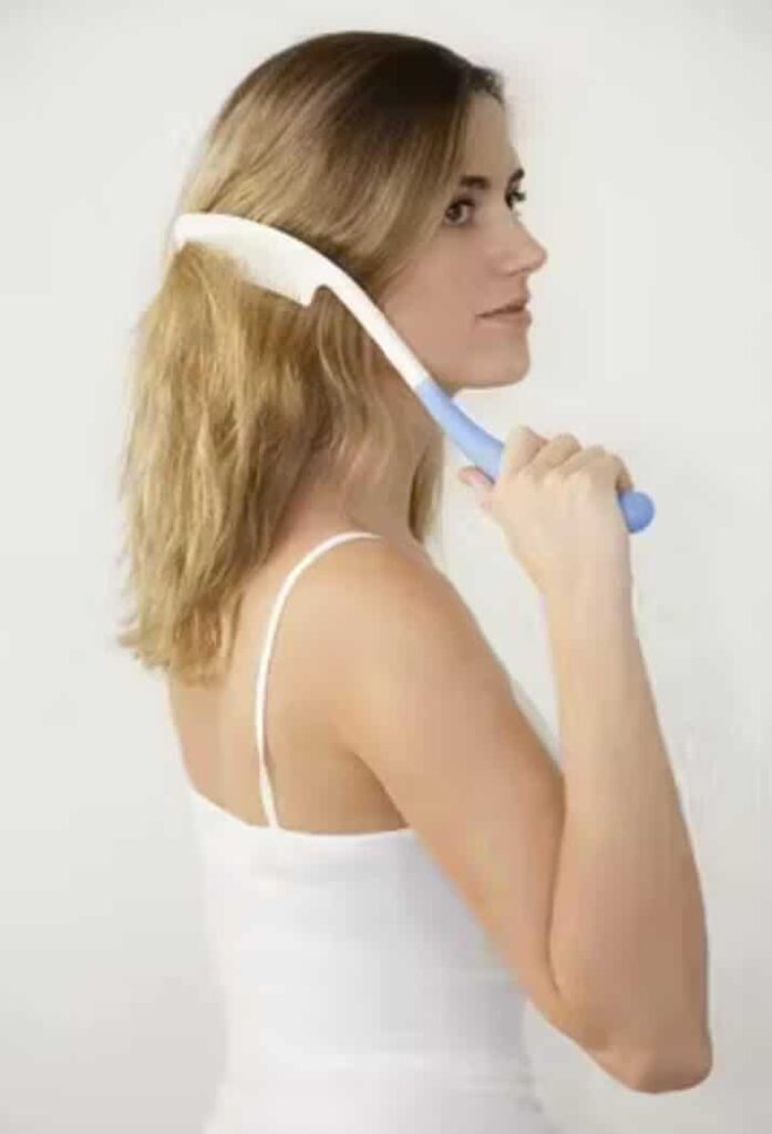Soft-brushed hair being styled with a hairbrush, demonstrating grooming tips.