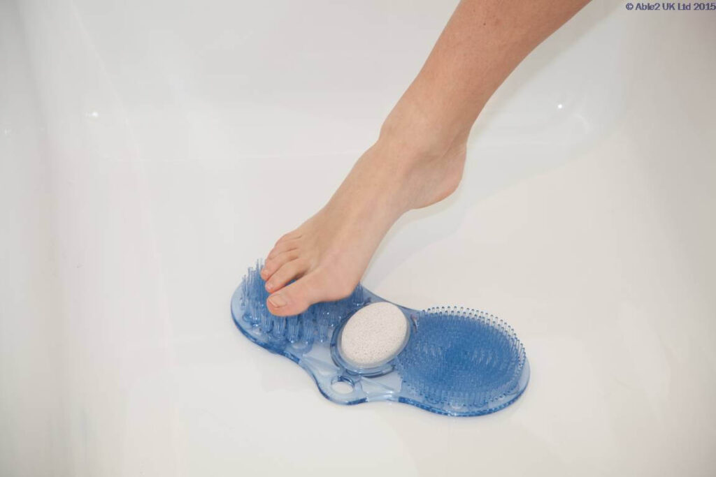 Non-slip bath foot massage mat with white sponge, accessible mobility aid.