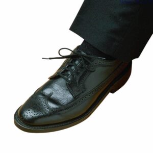 Smart black leather brogue shoe for men, stylish and comfortable footwear.