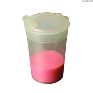 Feeding Cup Pink silicone travel cup with lid, ideal for mobility and outdoor use.
