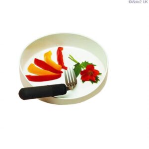 Vegan colourful peppers and herbs on white plate with fork, gluten-free healthy food concept.