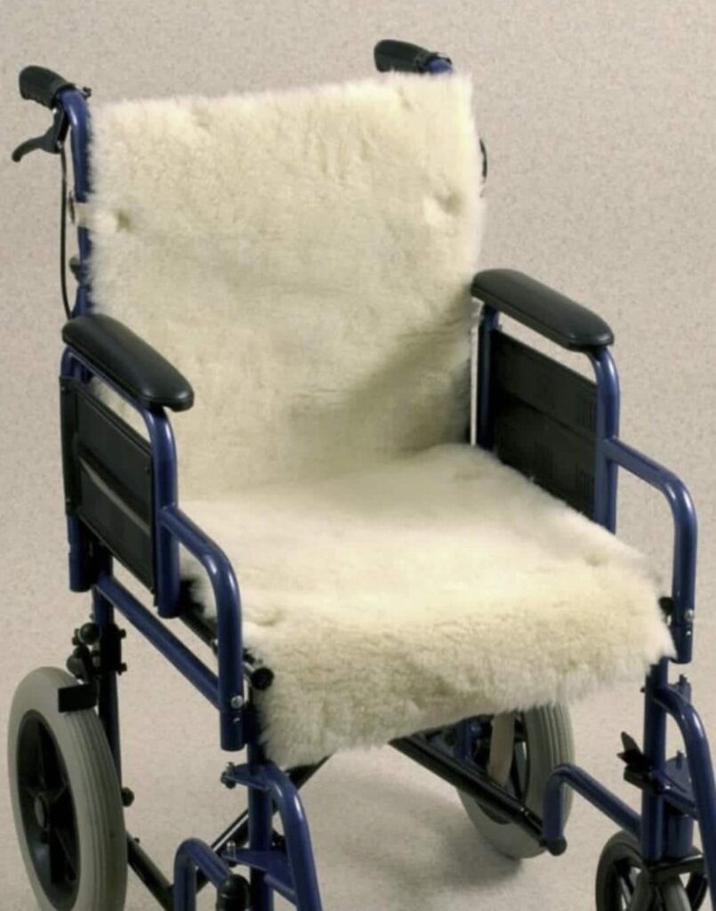 Soft plush wheelchair cushion for comfortable mobility assistance.