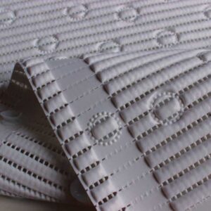 Adjustable white mobility ramp with anti-slip surface for accessible mobility solutions.