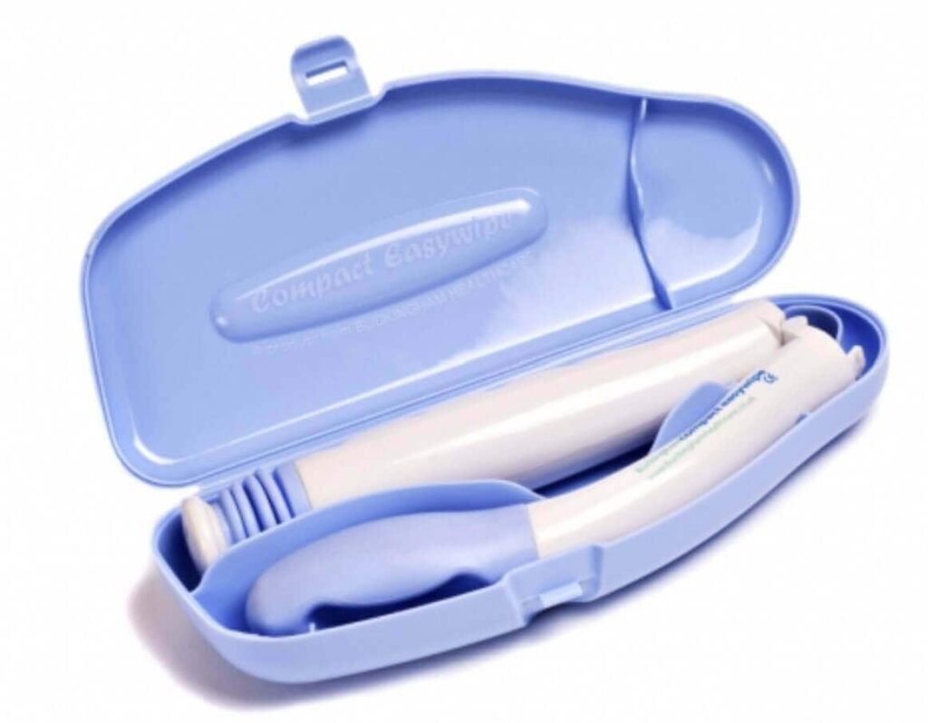 Plastic travel dental kit with toothbrush and toothpaste in a compact blue case.