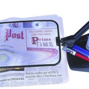 Bright digital magnifier for reading newspapers, ideal for mobility and visual aids.