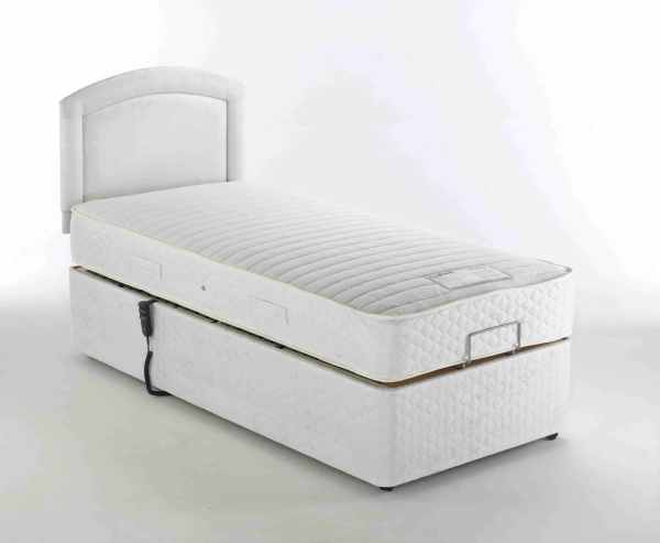 Soft hospital bed with electric adjustable height for senior mobility support.