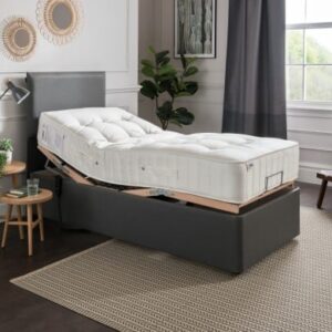 Comfortable adjustable bed for enhanced mobility and sleep support in a modern bedroom setting.