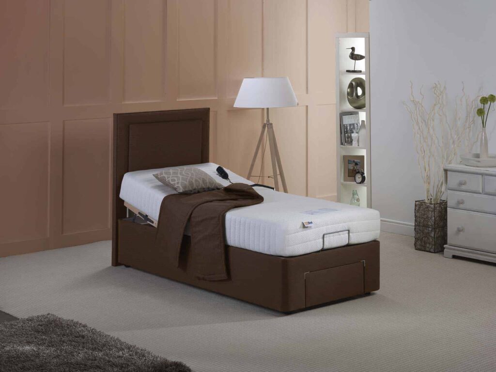 Comfortable adjustable hospital bed with brown wooden frame and remote control, ideal for mobility support.